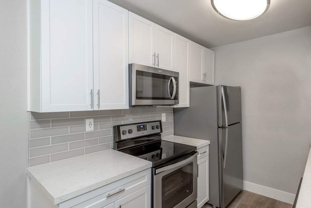 Kitchen with stainless steel appliances at The Indie Glendale Collection in Glendale, California