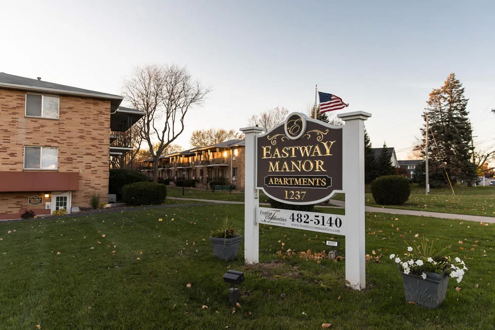 Community signage board at Eastway Manor Apartments in Webster, New York