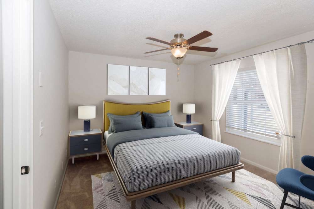 Bedroom with ceiling fan at Midtown Square Chattanooga Apartments in Chattanooga, Tennessee