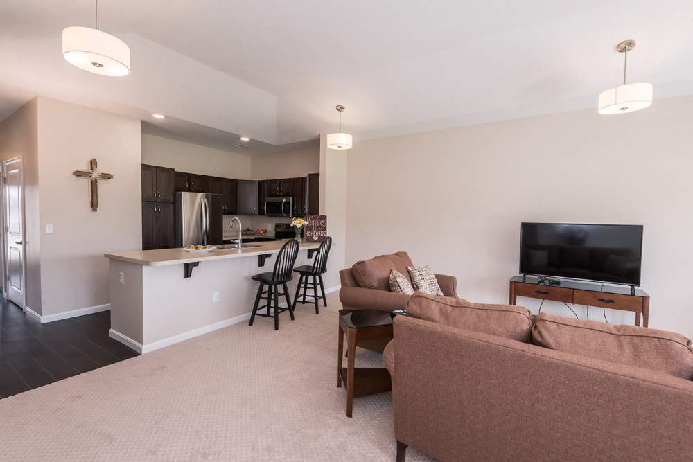 living room and kitchen at Legacy Living Fishers in Fishers,Indiana