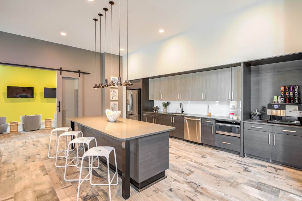 clubroom with entertaining kitchen and coffee machine Flats at 540 Best Apartments For Rent in Apex NC
