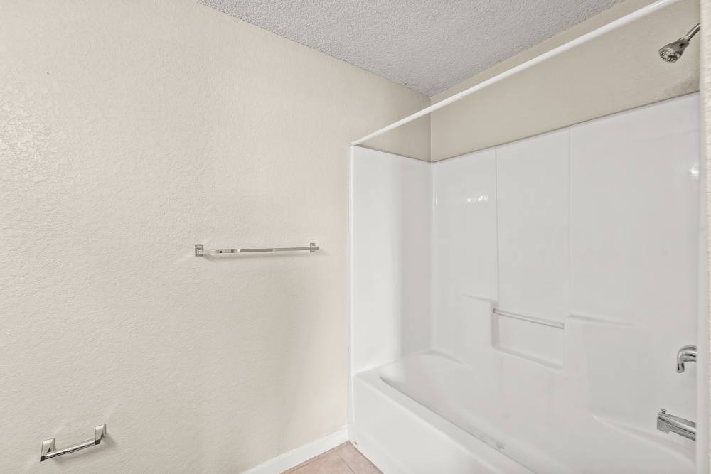 bathroom with white bathtub at Callaway Village Apartments in Fulton, Missouri