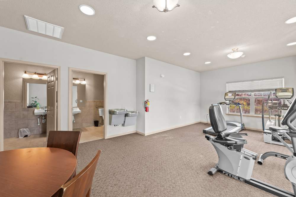 Fitness center with access to restrooms at Callaway Village Apartments in Fulton, Missouri