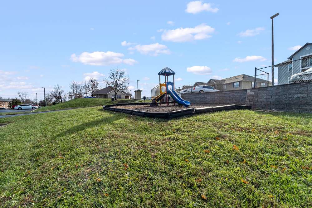 Children's play area at Callaway Village Apartments in Fulton, Missouri