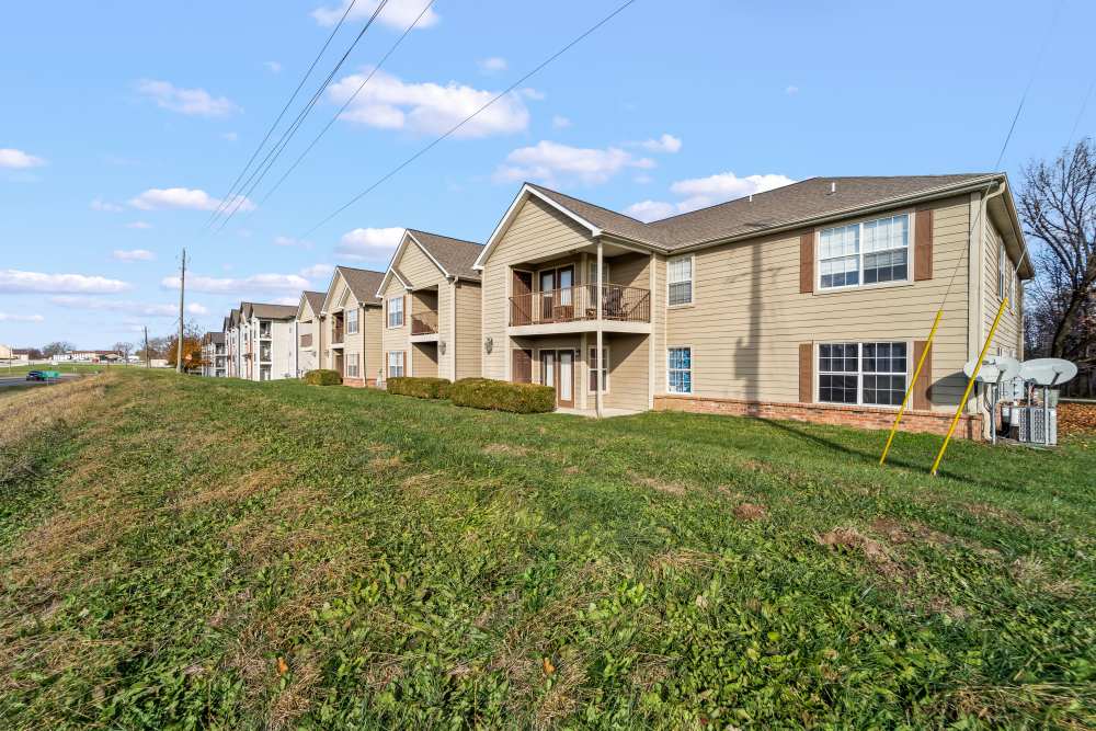 Exterior view of the building showcasing balconies, windows at Callaway Village Apartments in Fulton, Missouri