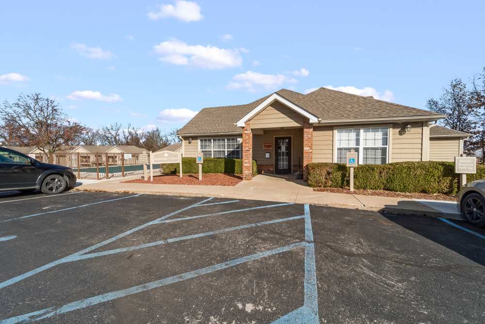 Leasing office and handicap parking at Callaway Village Apartments in Fulton, Missouri