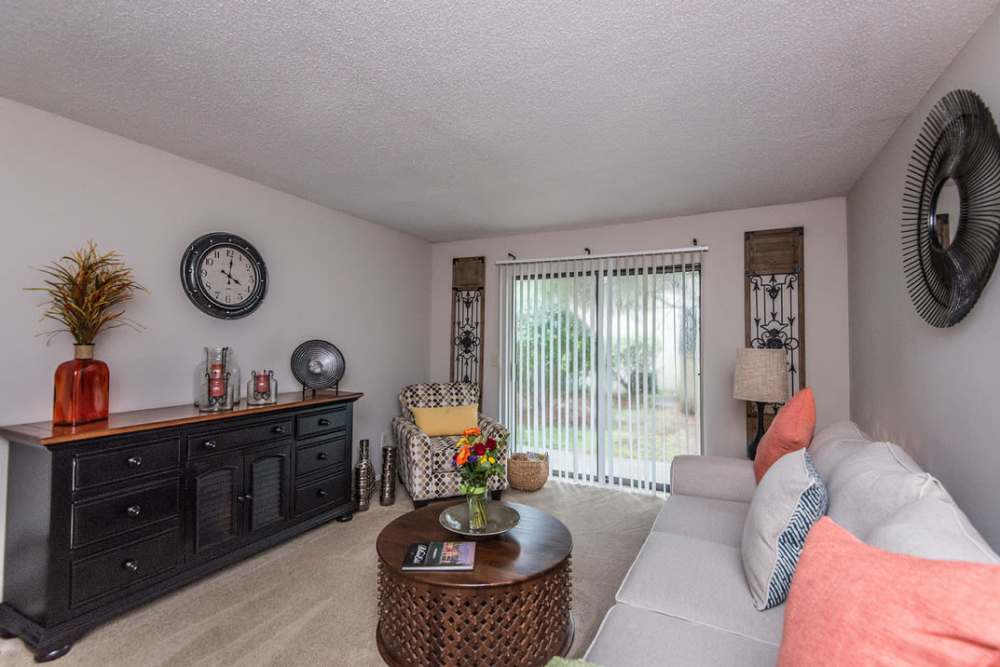 Living room with couch at Spanish Oaks in Charleston, South Carolina