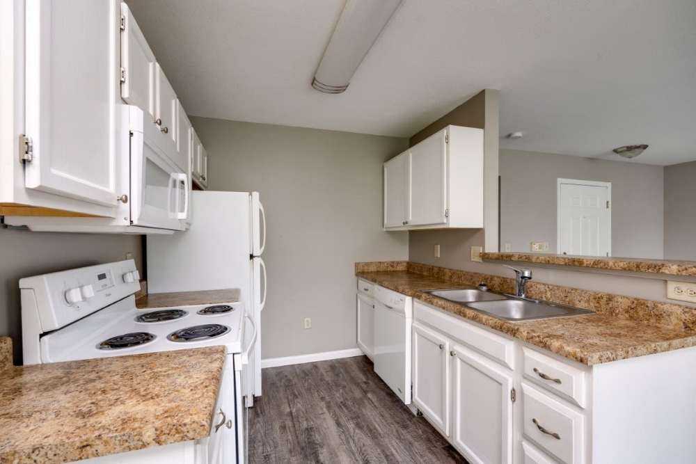Kitchen with white cabinetries at Ashton Glen in Centerville. OH