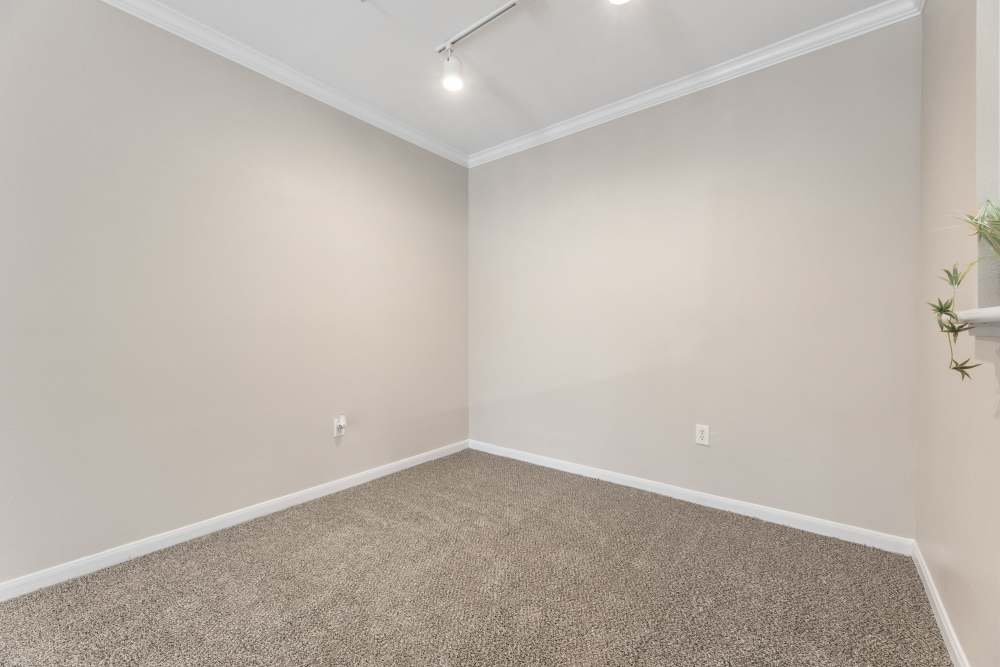 Bedroom with carpet flooring at Columbia Greens in Houston, Texas