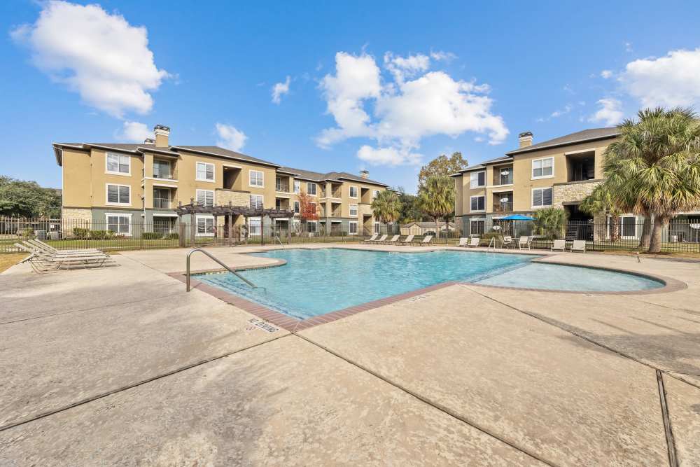 Swimming pool with kids pool and lounge seating  at Columbia Greens in Houston, Texas