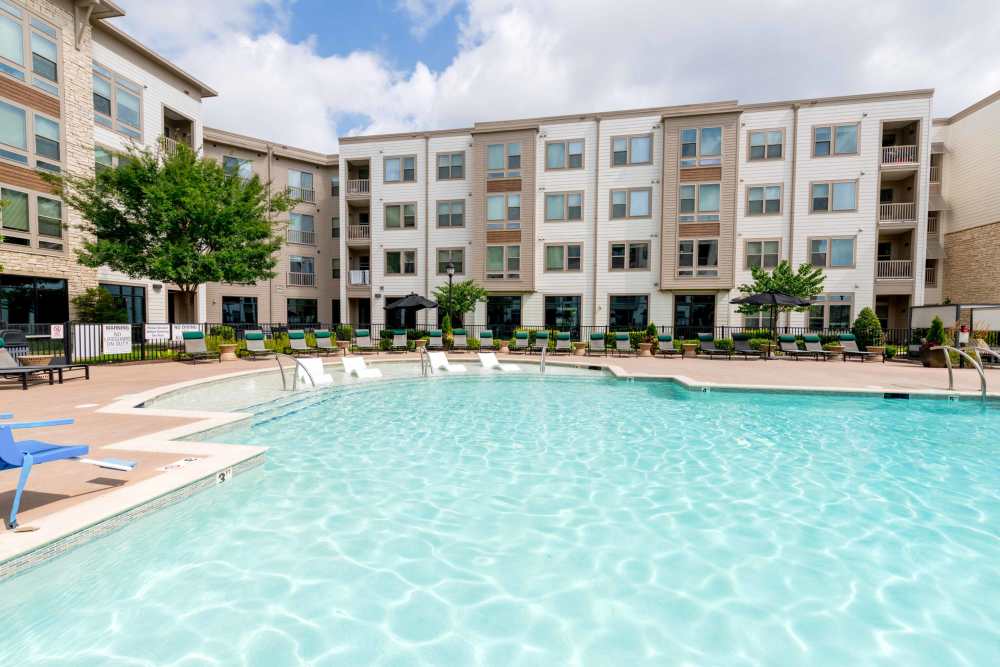 pool area with chairs The Reserve at Patterson Place  durham NC luxury apartments