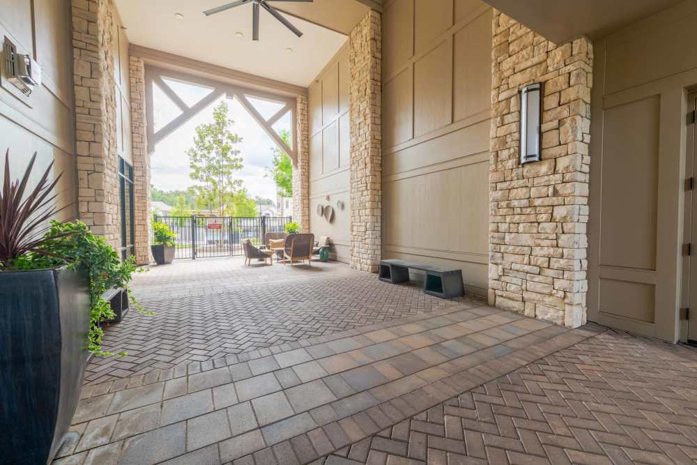 outdoor lounge area with chairs and tables The Reserve at Patterson Place  durham NC luxury apartments