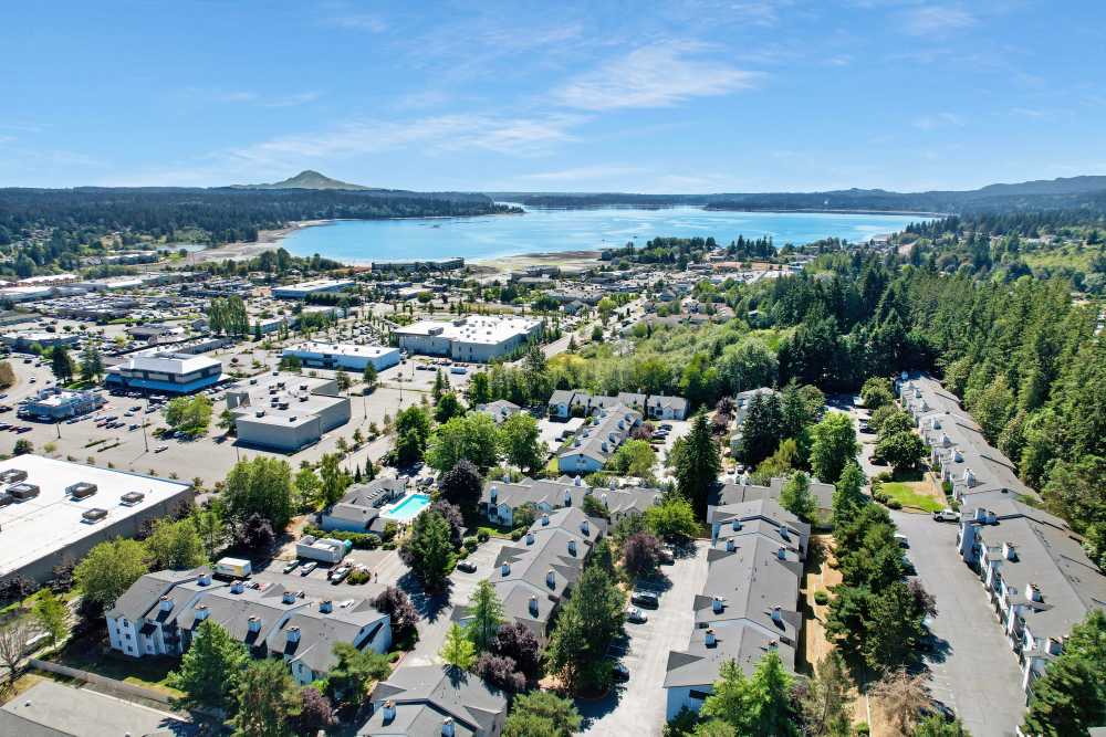 Aerial View of Property and Lake at Wellington Apartments in Silverdale, Washington
