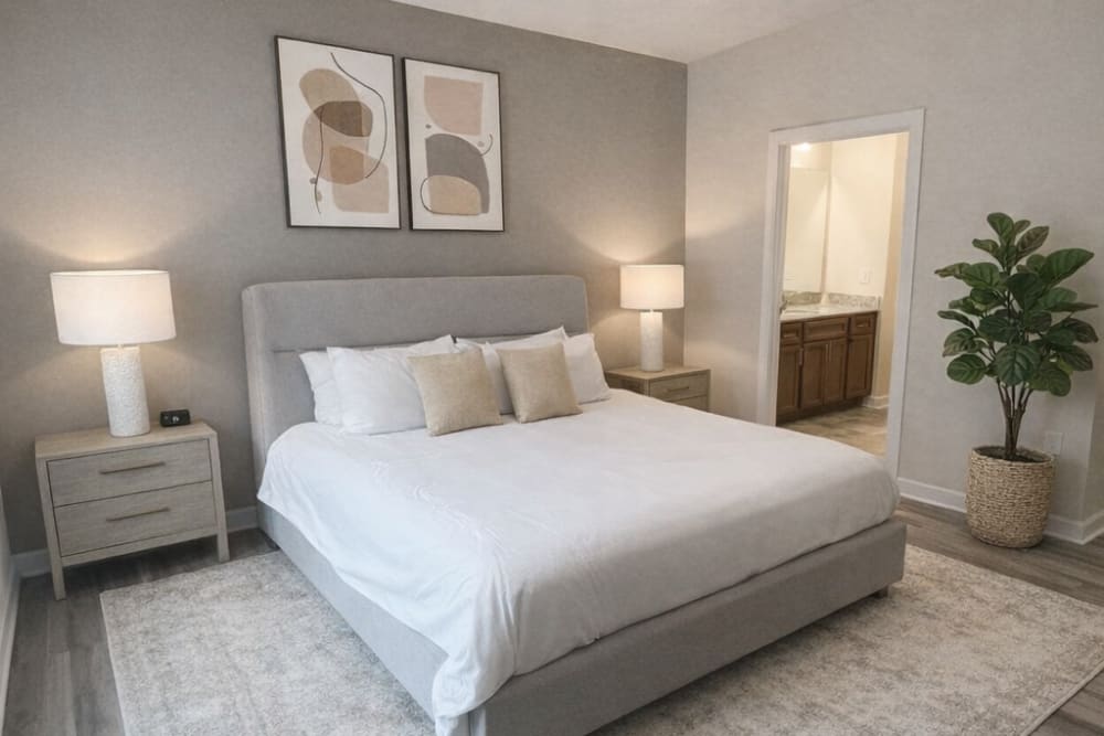 Furnished bedroom at Palisades of Wake Forest in Wake Forest, North Carolina