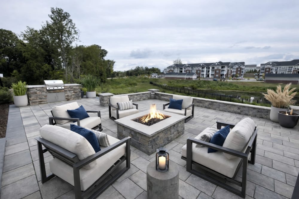 Furnished outdoor firepit area at Palisades of Wake Forest in Wake Forest, North Carolina