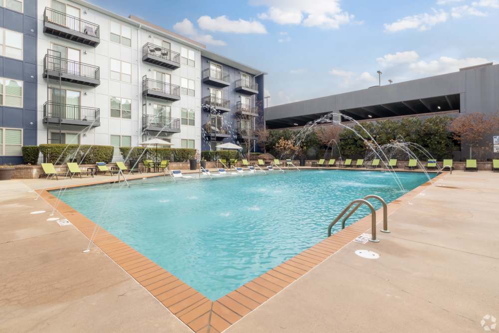Lounge chairs surround the swimming pool at South Ridge in Greenville, South Carolina