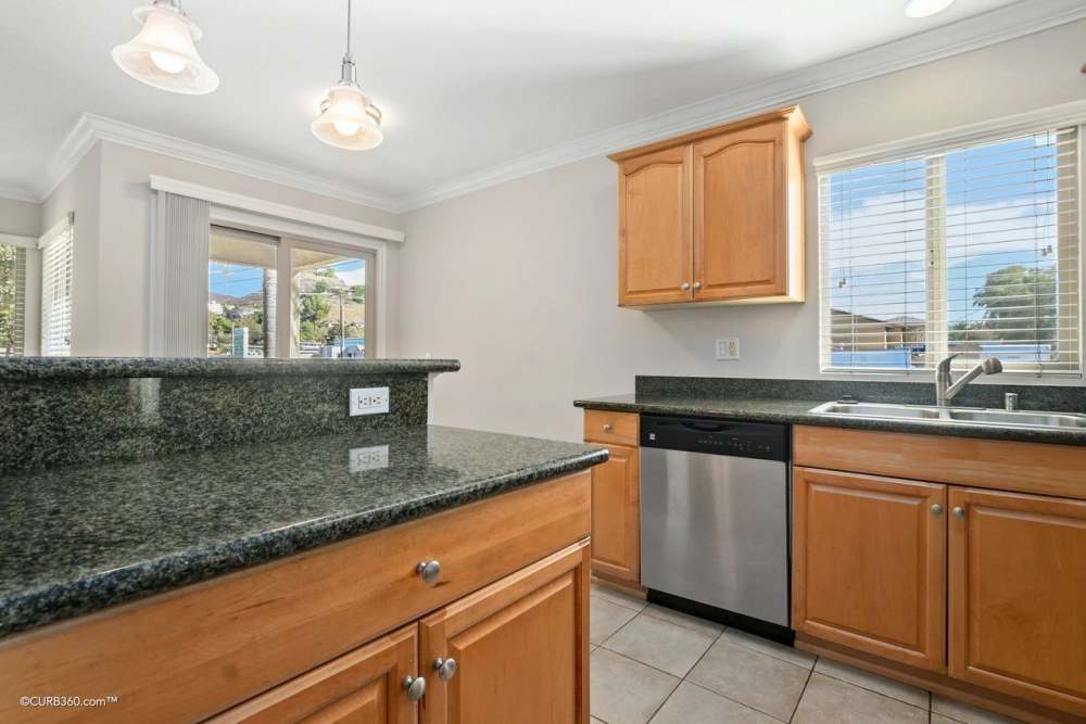 Apartment kitchen at Bostonia in El Cajon, California