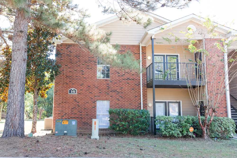 Building exterior with trees alla round at Annandale Park in Robertsdale, Alabama