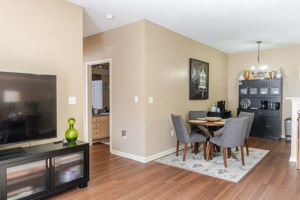 View of the living room and the kitchen at Annandale Park in Robertsdale, Alabama