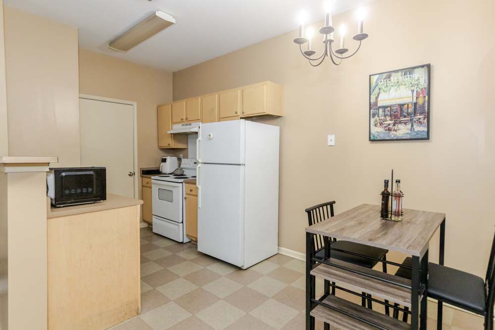 Kitchen with refrigerator at Annandale Park in Robertsdale, Alabama