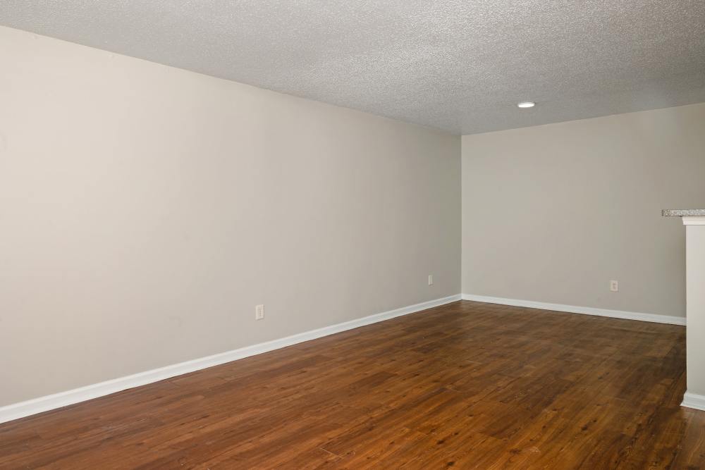 Spacious bedroom with wood-style flooring at Carson Landing in Center Point,Alabama