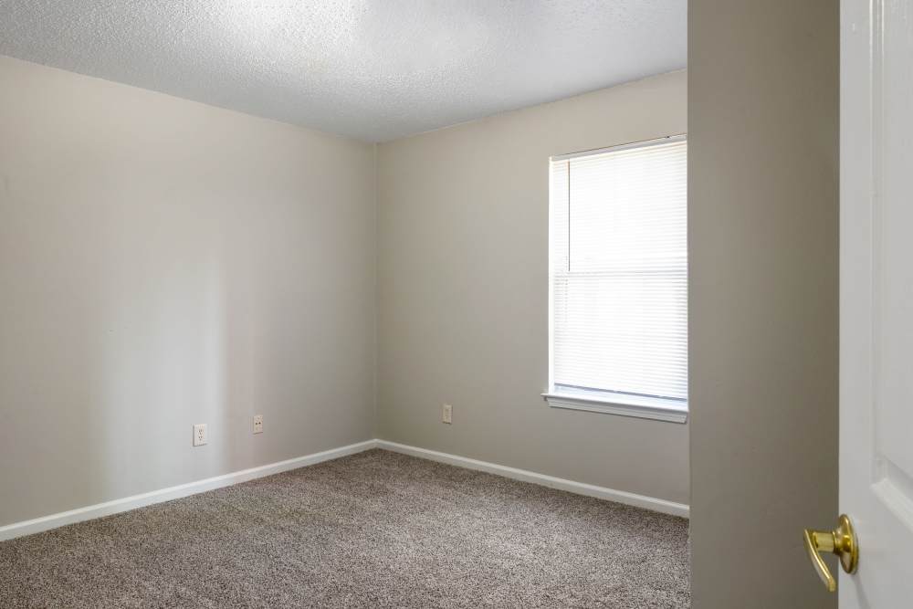 Bedroom with a window at Carson Landing in Center Point,Alabama