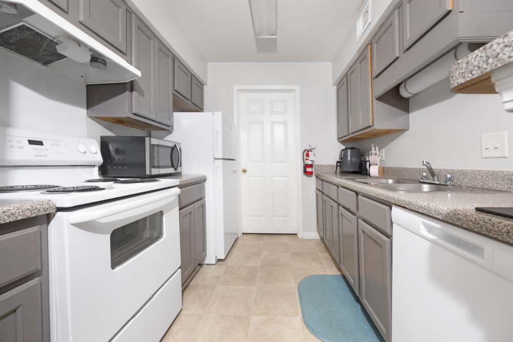 Kitchen with white appliances at Carson Landing in Center Point,Alabama