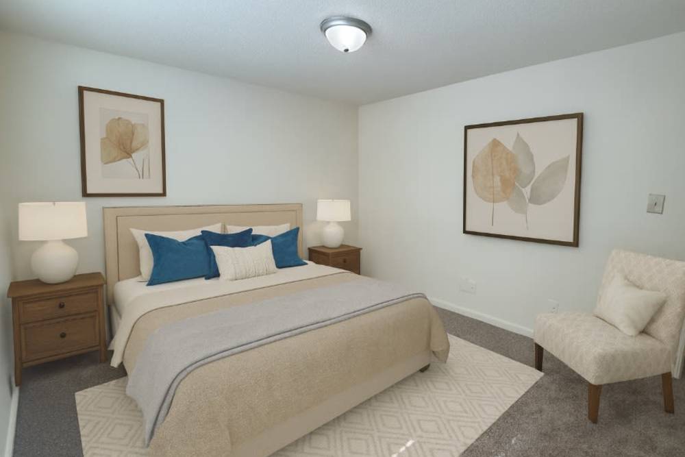 Spacious bedroom with plush carpeting and modern finishes at Hudson Woods in Gastonia, North Carolina