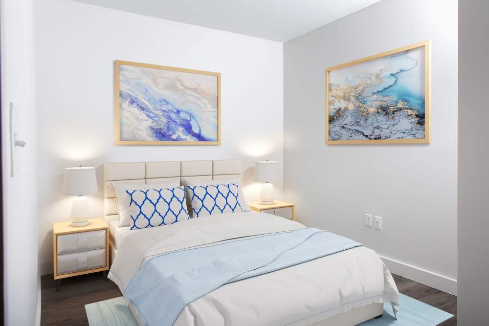 Spacious bedroom with wall arts at The Lighthouses in Salem, Massachusetts