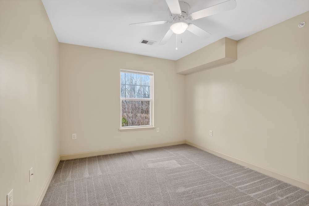 Bedroom with ceiling fan at Cooper Creek Heights in Mocksville, North Carolina