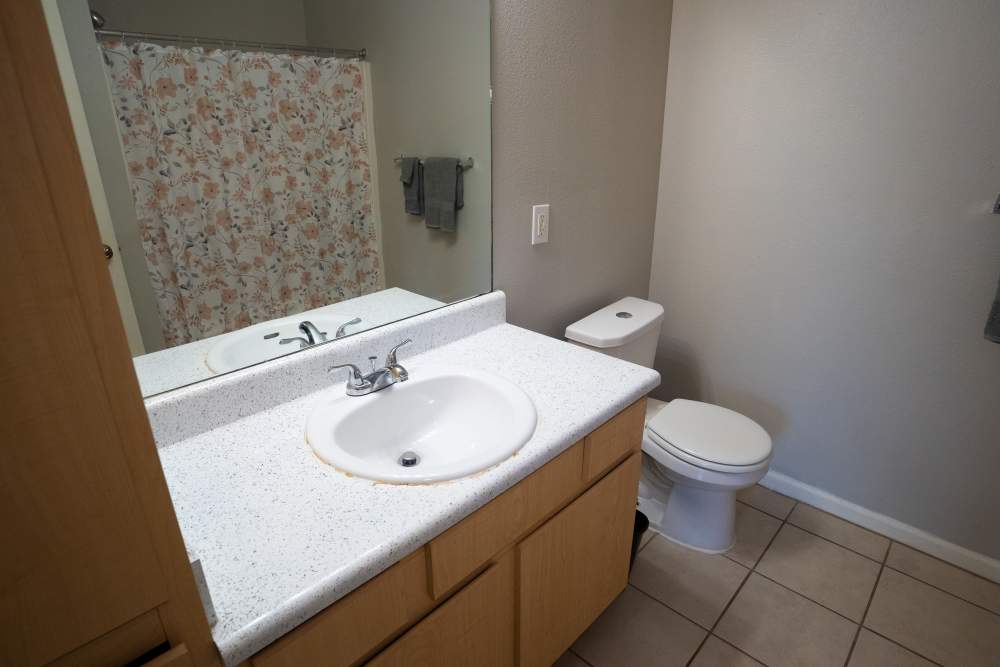 Bathroom with a toilet at Hampton Chase in Palestine, Texas
