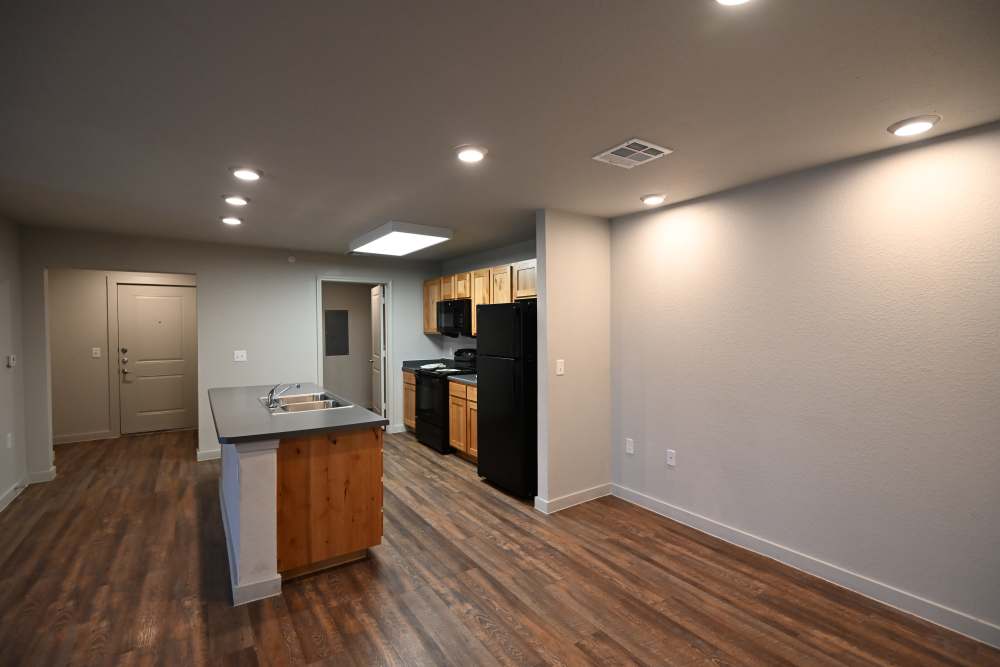 Kitchen with wooden flooring at Carver Ridge in Hutto, Texas