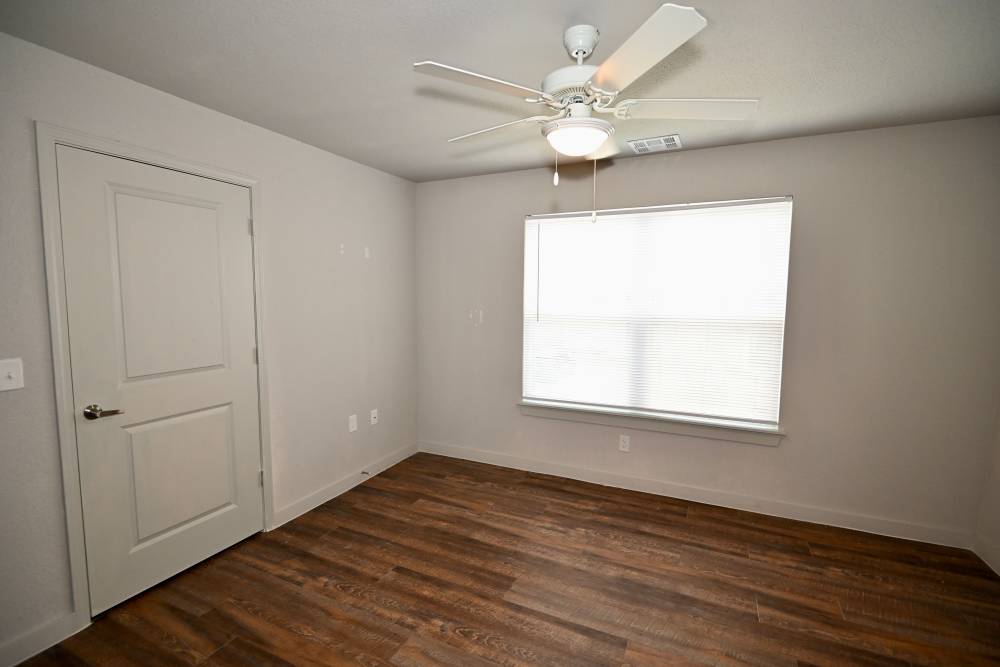 Bedroom with a window at Carver Ridge in Hutto, Texas