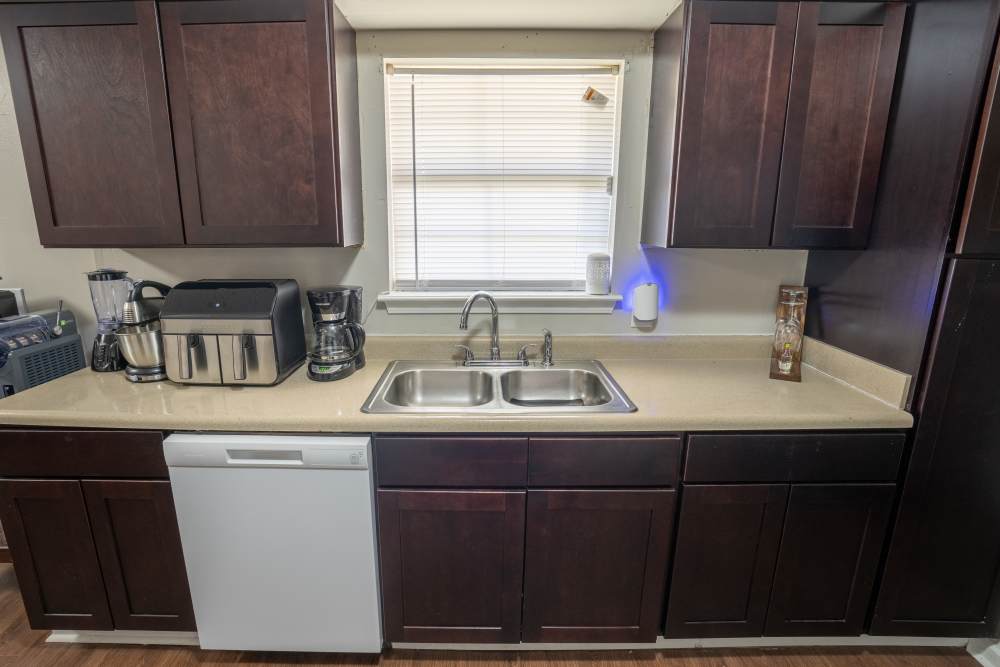 Kitchen with wooden cabinets at Arrington Estates of West Memphis in West Memphis,Arkansas