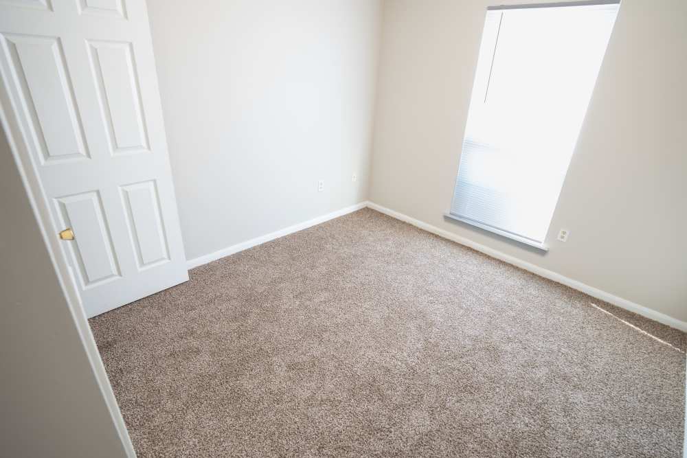Bedroom with carpet flooring at Arrington Estates of West Memphis in West Memphis,Arkansas