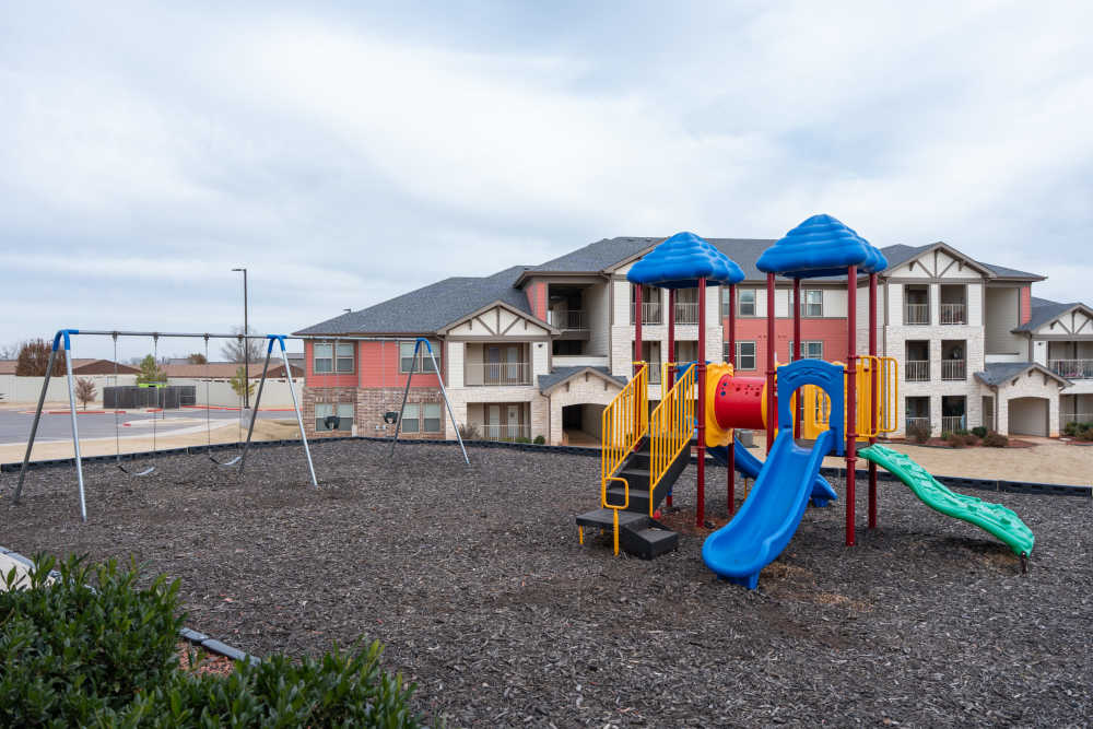 Community playground with slidders at Estates At Rockwell in Oklahoma City, Oklahoma