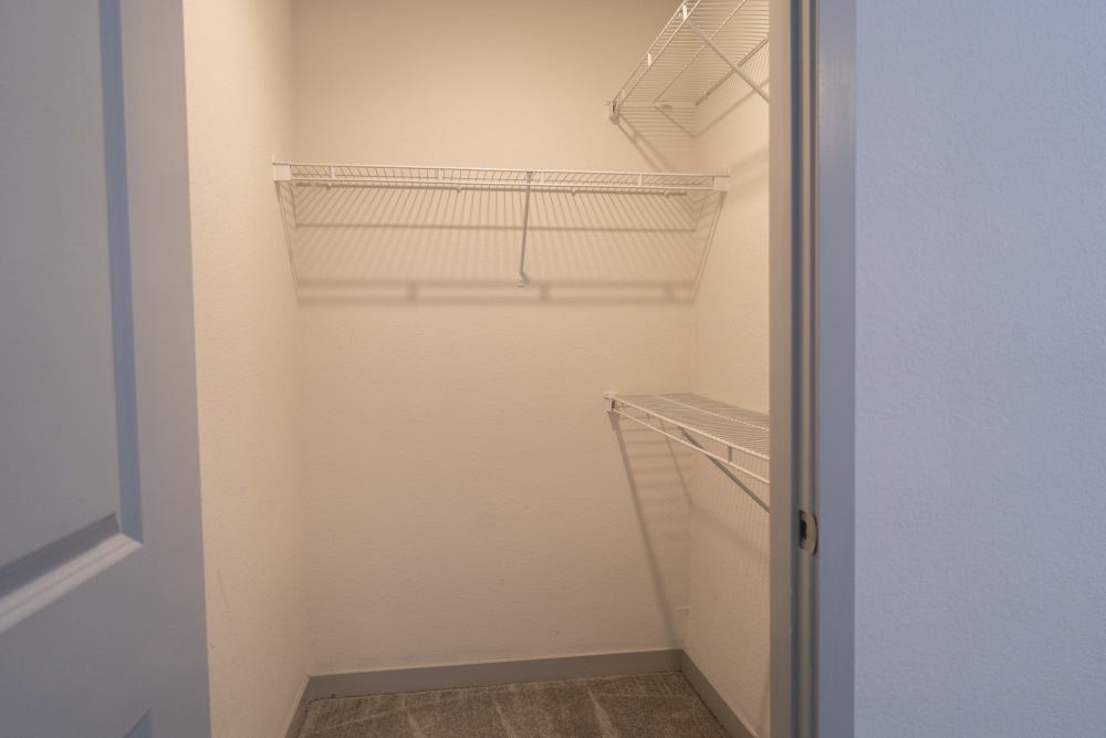 Walk-in closet at Estates At Rockwell in Oklahoma City, Oklahoma