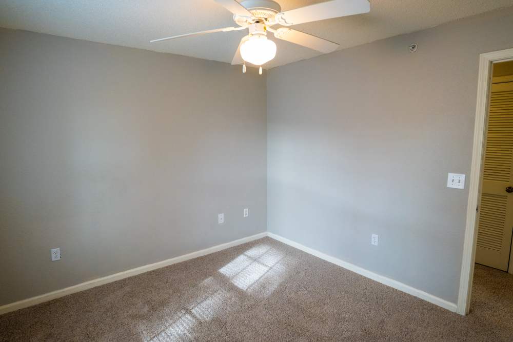 Bedroom with carpet flooring  at Hampton Village in Palestine, Texas