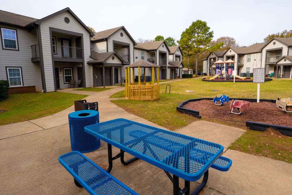 Playground with seating at Hampton Village in Palestine, Texas