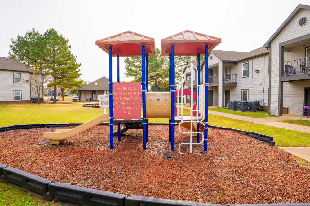 Kids combo sliding's in playground at Hampton Village in Palestine, Texas