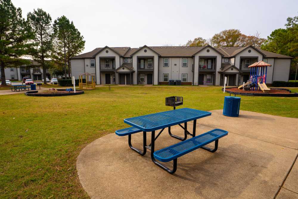 Seating bench in playground at Hampton Village in Palestine, Texas