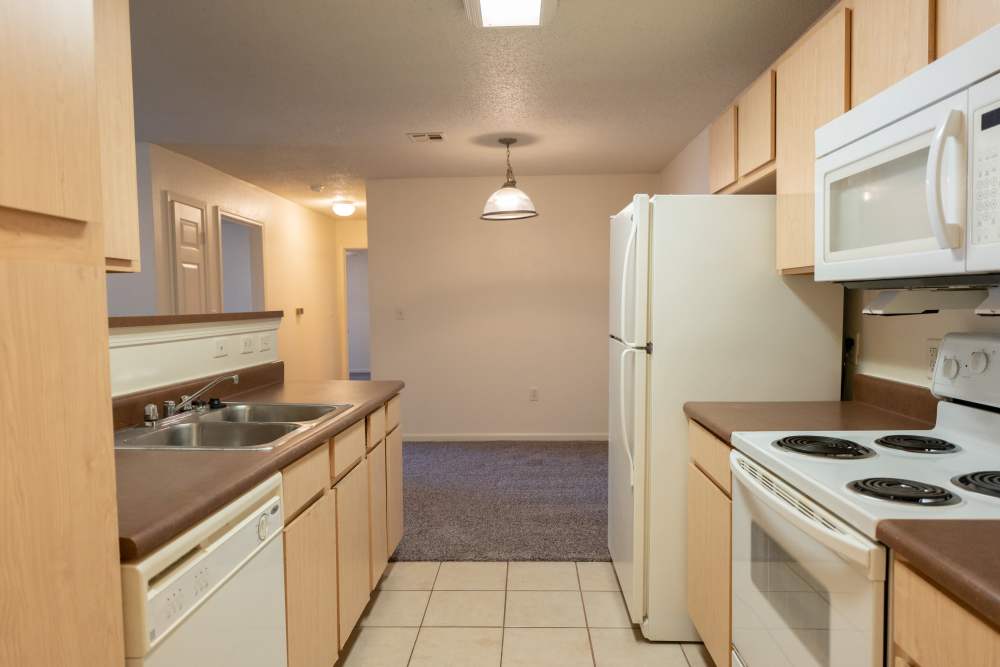 Fully equipped kitchen with white appliances at Elizabeth Place in El Reno, Oklahoma
