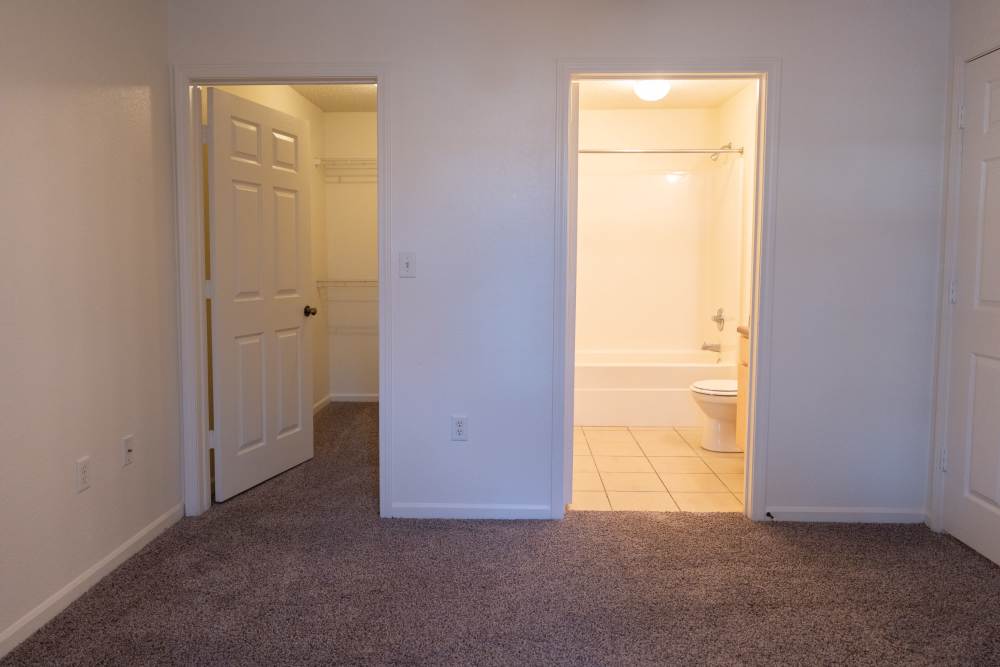 Bedroom with closet and attached bathrppm at Elizabeth Place in El Reno, Oklahoma