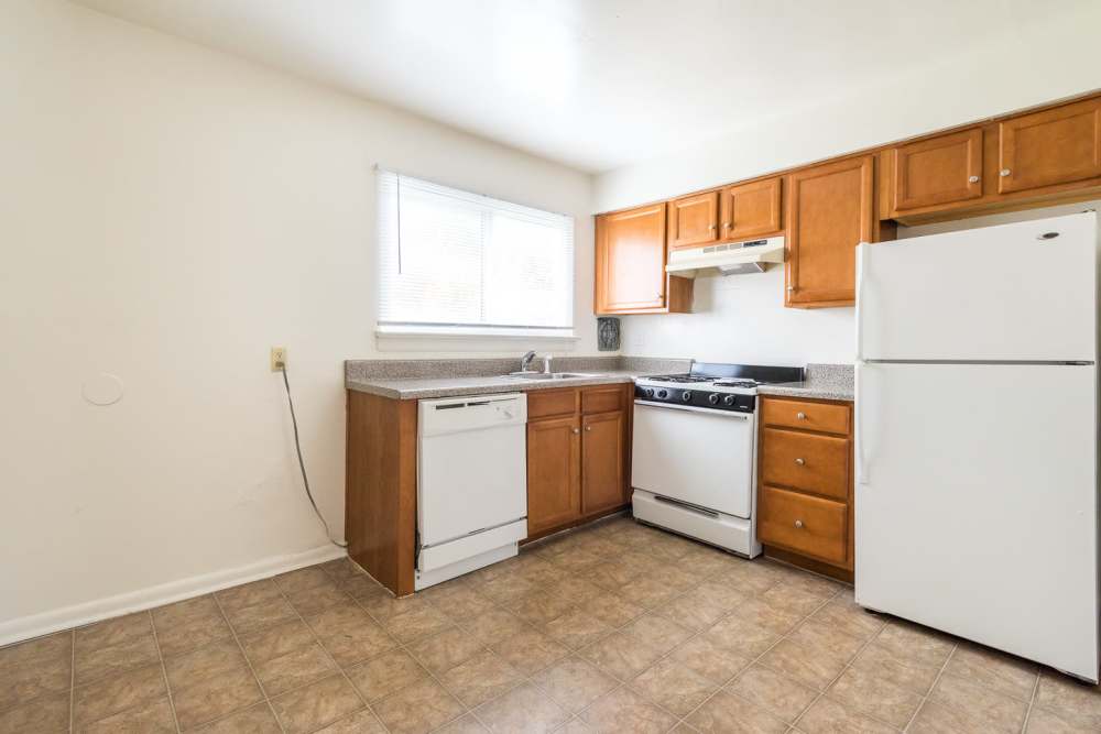 Kitchen with white appliances at Deering Manor in Richmond,Virginia