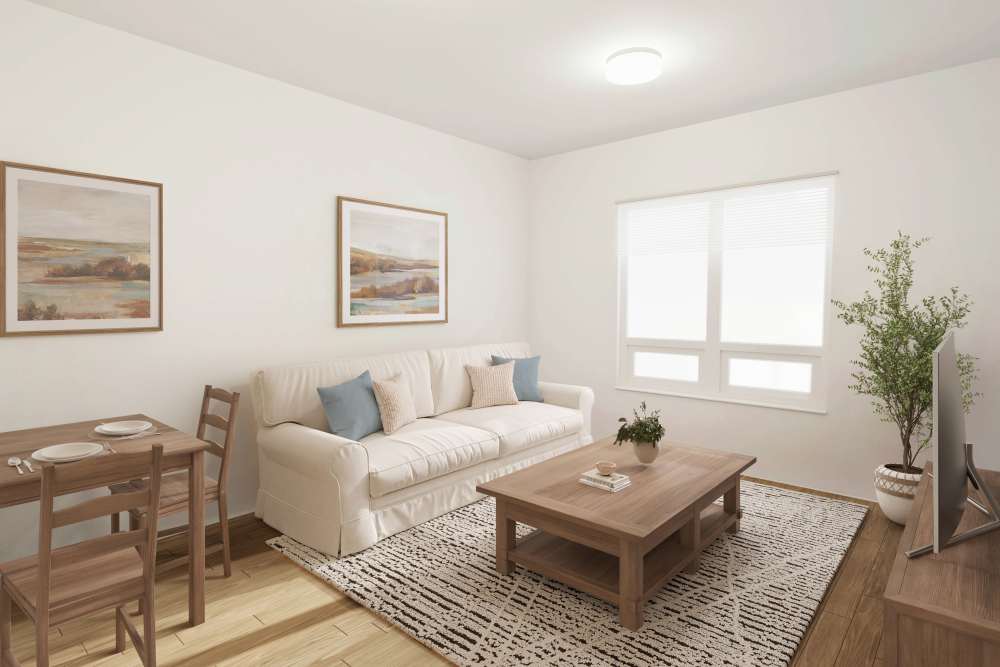 Bright living room at The Avenue at Greenmont in Dracut,Massachusetts