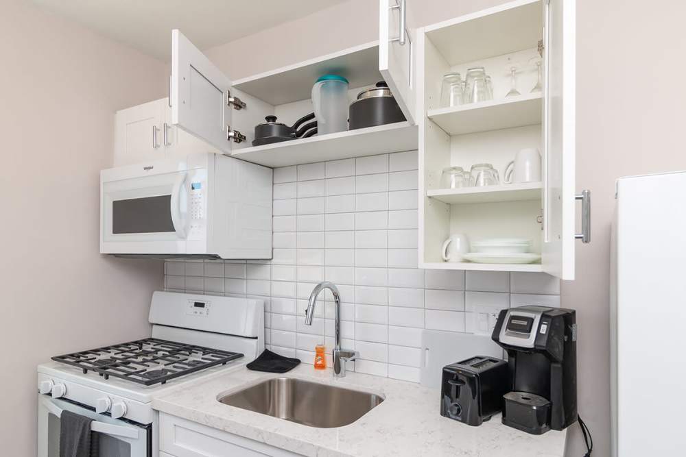 Kitchen with cupboards at Iwood I in Inglewood,California