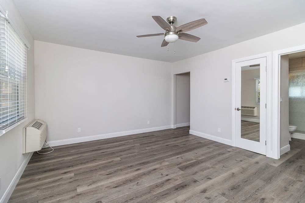 Living room with wood-style flooring at Iwood I in Inglewood,California
