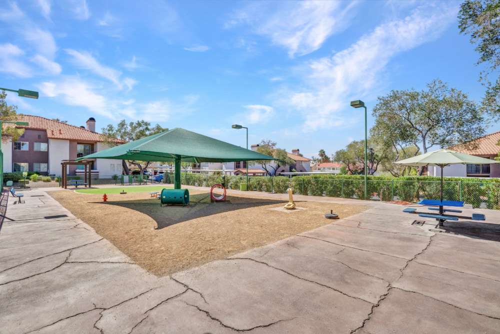 Play area with covered seating at Fairways on Green Valley in Henderson, Nevada