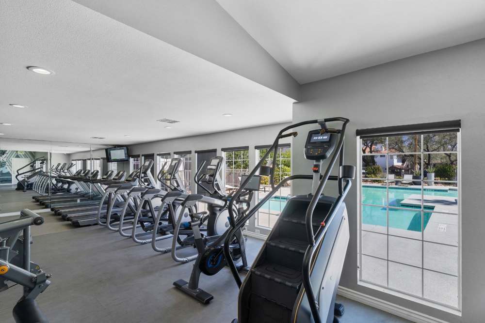Cardio machines overlooking pool area at Fairways on Green Valley in Henderson, Nevada
