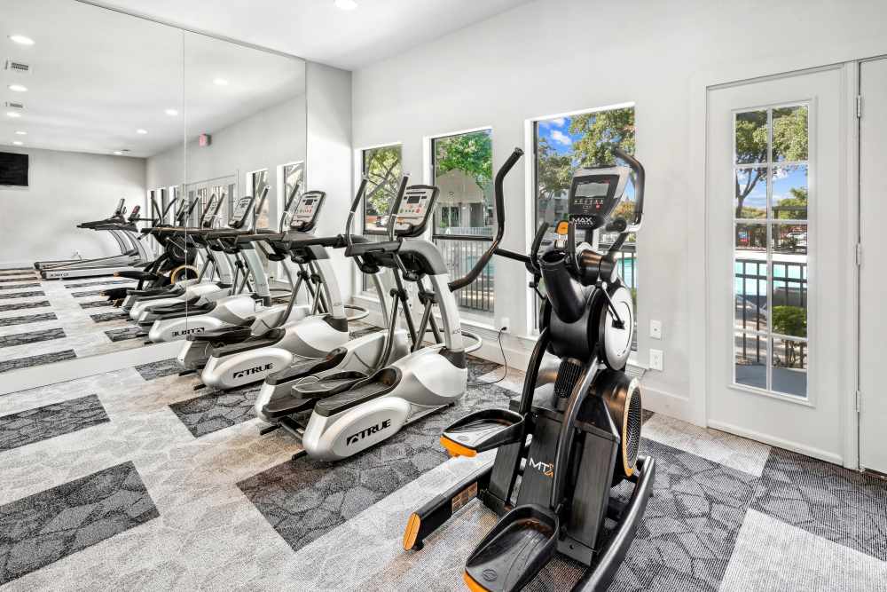 Fitness center with modern equipment at Avondale Parc at Bellmar in Dallas. TX